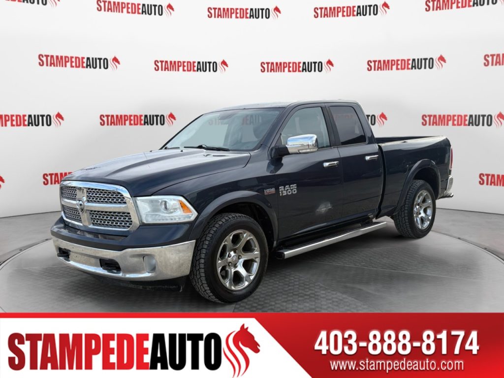 2013 Ram 1500 Laramie | 5.7L HEMI | 4X4 | LEATHER INTERIOR | SUNROOF | POWER SLIDING REAR WINDOW | POWER/HEATED/COOLED SEATS | DUAL CLIMATE CONTROL | STEERING WHEEL CONTROLS | LARGE TOUCH SCREEN | INTEGRATED TRAILER BRAKE | HEATED STEERING WHEEL | Stampede Auto