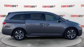 2014 Honda Odyssey Touring | LEATHER | POWER/HEATED SEATS | SUNROOF | POWER SLIDING DOORS | POWER HATCH | REAR ENTERTAINMENT | DUAL CLIMATE CONTROL | REAR CLIMATE CONTROL | REMOTE START | USB PORT | Stampede Auto